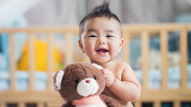 Baby with teddy bear