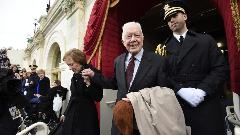 Jimmy Carter and Rosalynn Carter arriving at Donald Trump's inauguration with