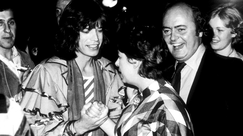 Princess Margaret and Mick Jagger smiling 