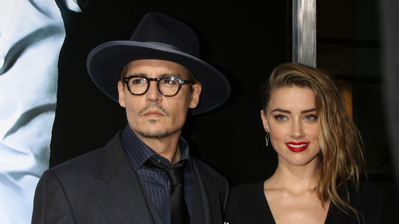 Johnny Depp and Amber Heard at a movie premier