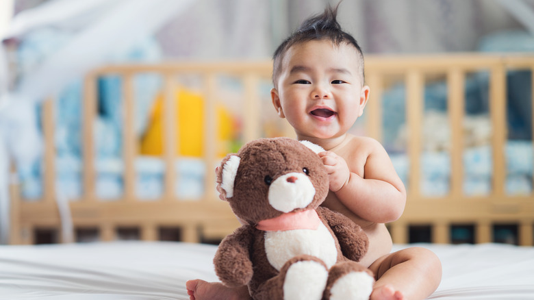 Baby with teddy bear