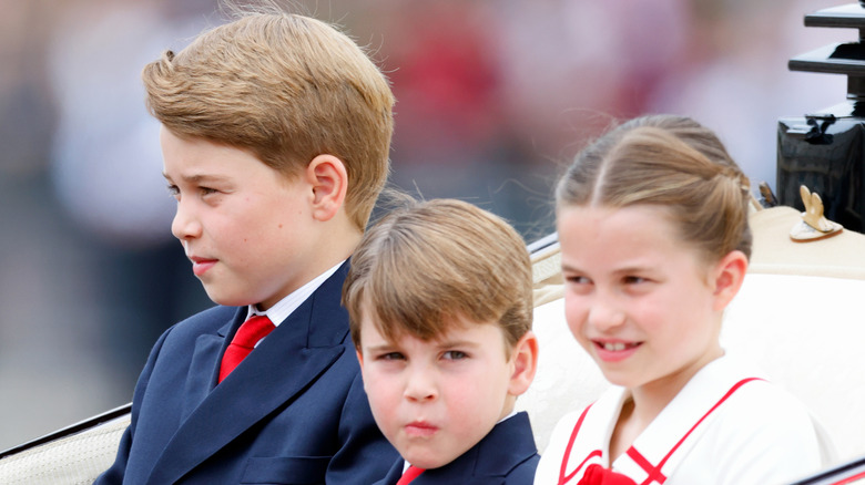 Prince George, Prince Louis and Princess Charlotte sitting together