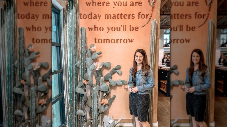 Jana Duggar with cactus and sign Where You Are Today