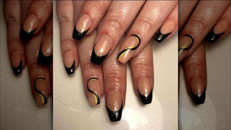 Chrome over black tips with gold swirl