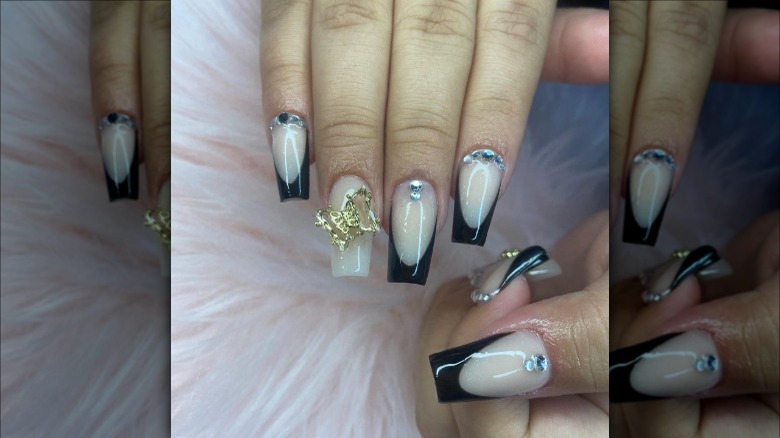 Black tips with a gold butterfly