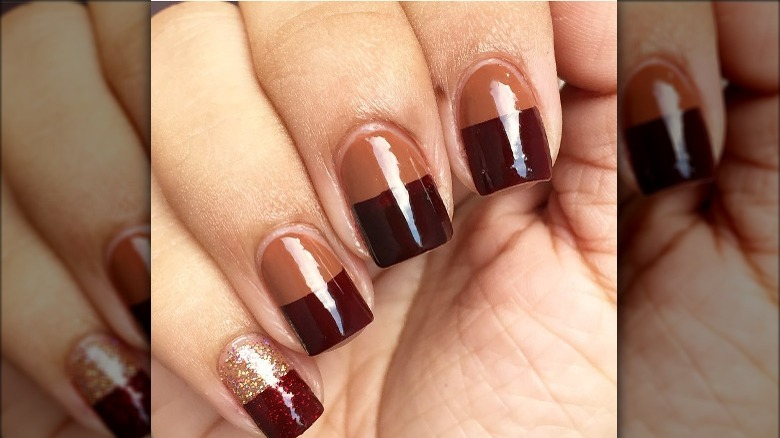 Dark maroon tips with glitter