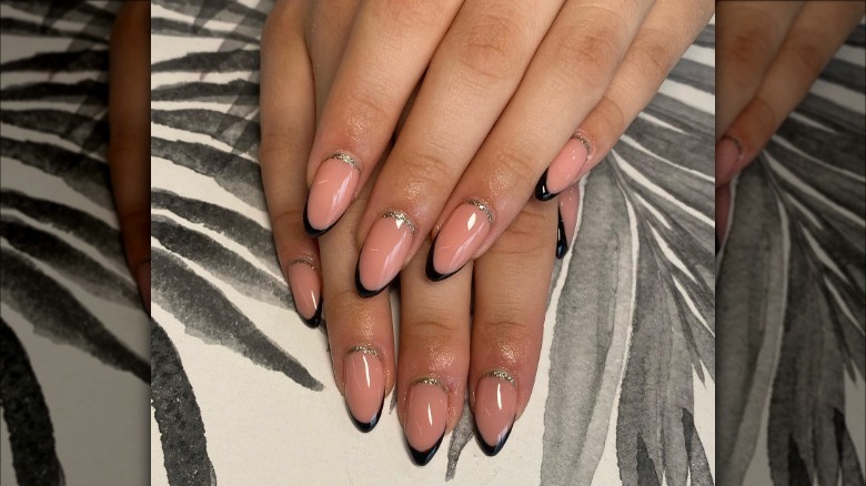 Almond black French manicure with silver