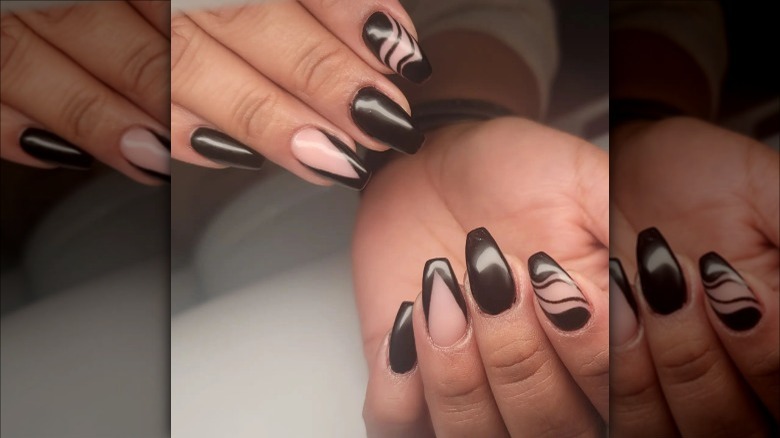 Coffin tip nails with black tips and swirls