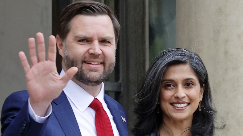 JD Vance waving next to Usha Vance