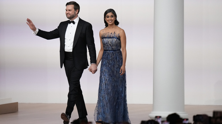 J.D. and Usha Vance walking across stage at the inauguration ball