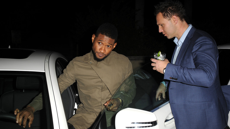 Usher attending a Mercedes event