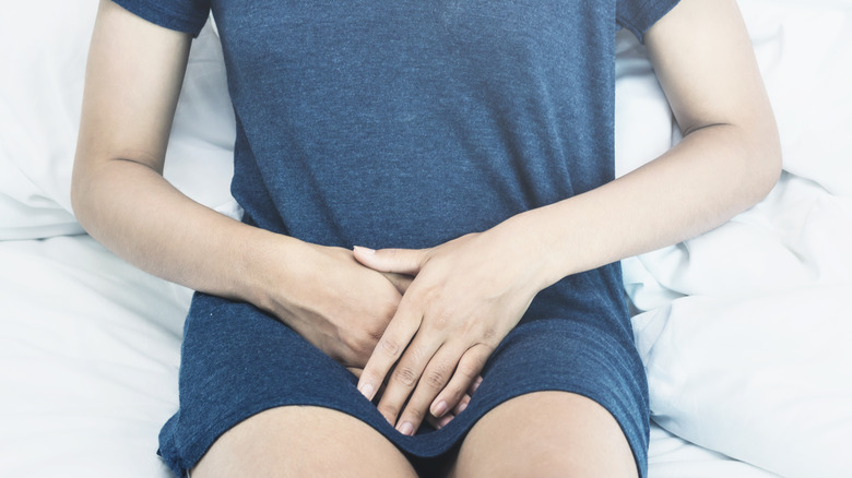 woman with bladder pain from a UTI