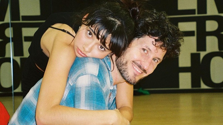 Xochitl Gomez and Val Chmerkovskiy hugging