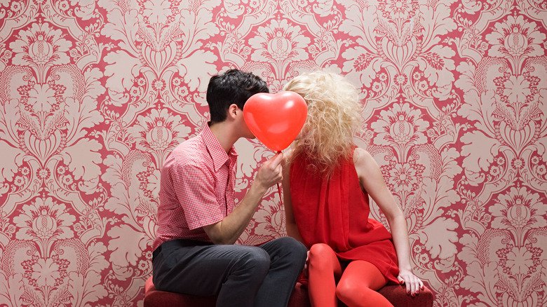 Couple with heart balloon