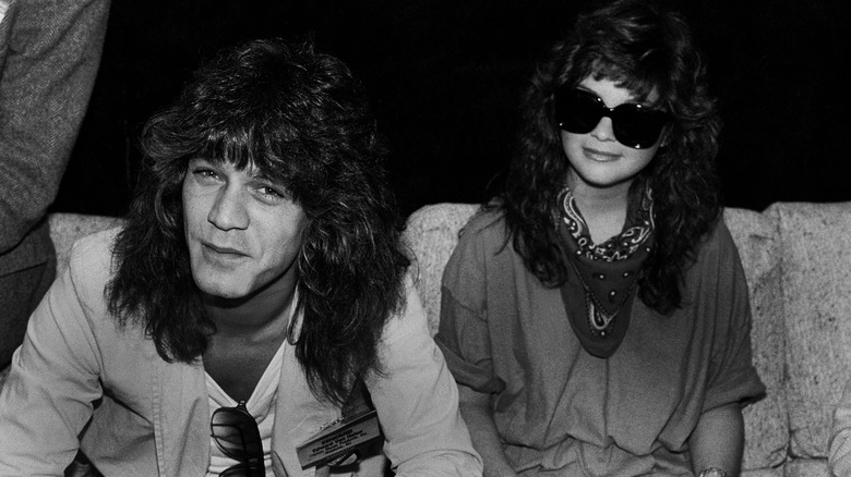 Eddie Van Halen and Valerie Bertinelli sitting together in Chicago, IL 1983