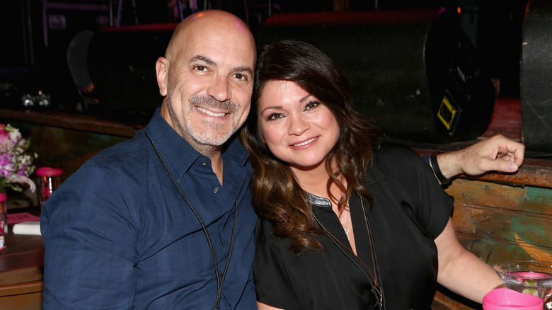 Tom Vitale and Valerie Bertinelli smiling at Power of Pink event 2014