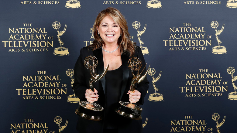 Valerie Bertinelli holding her Emmy Awards