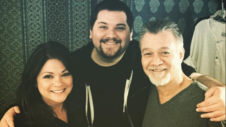 Valerie Bertinelli, Eddie Van Halen, and Wolfgang Van Halen smiling