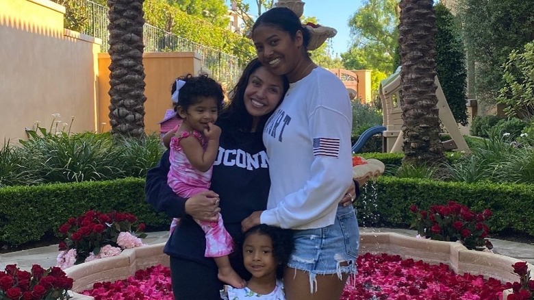 Vanessa Bryant posing with her daughters without makeup