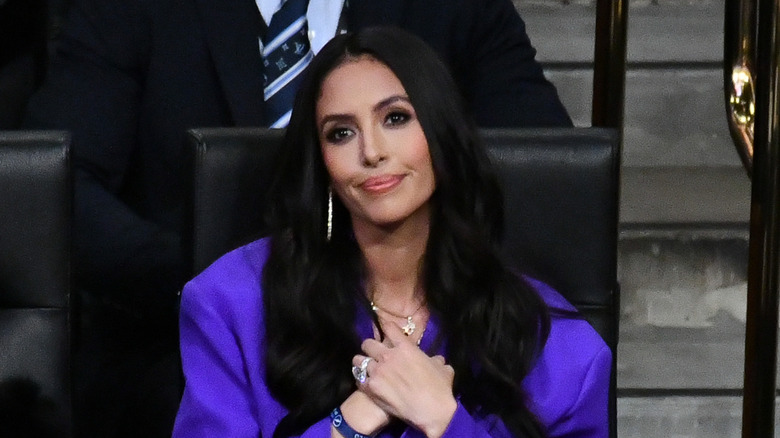 Vanessa Bryant sitting in a crowd and smiling