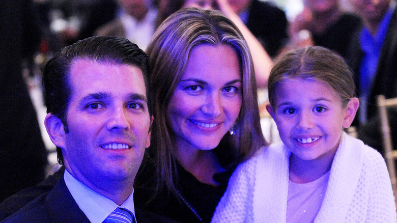 Donald Trump Jr. and Vanessa Trump posing with young Kai Trump