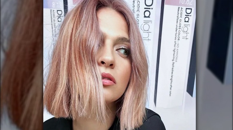 Girl with rose gold box bob