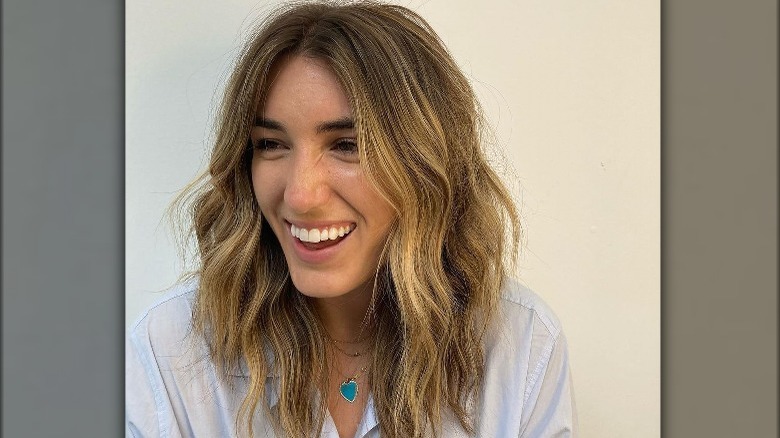 Happy girl with shaggy lob haircut