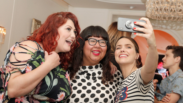 Joy Nash, Virgie Tovar, and Sophia Bush posing for selfie