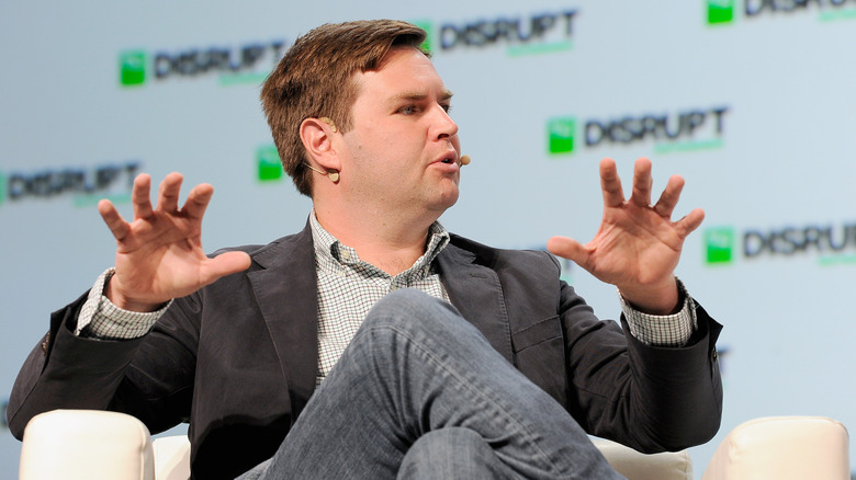 J.D. Vance speaking with hands in the air