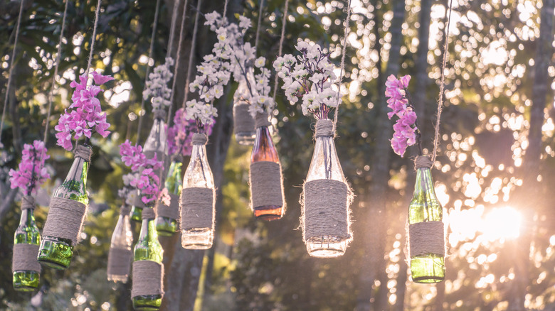 Hanging wine bottle vases