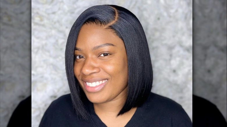 woman with bob haircut smiling