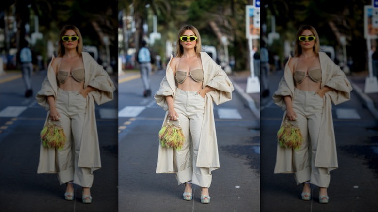 Woman in beige outfit