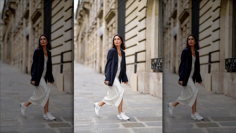 Woman in white sneakers