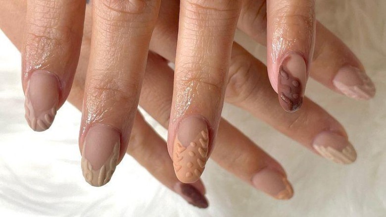 abstract french tip sweater nails