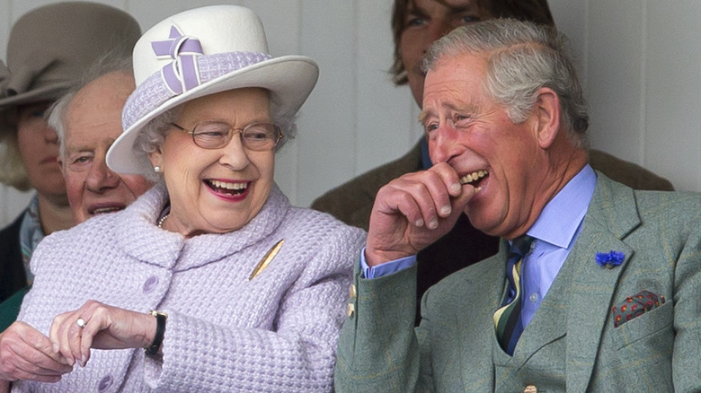 Queen Elizabeth and Prince Charles laughing