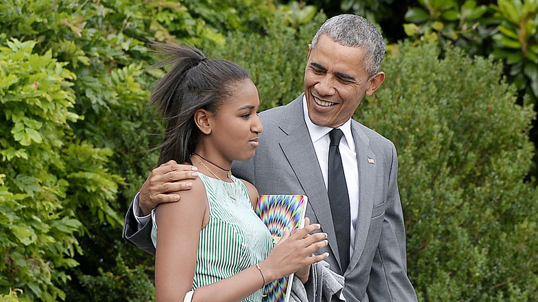 Sasha Obama and Barack Obama