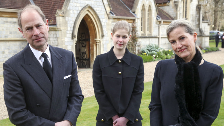 Prince Edward with Sophie and Louise dressed in black 