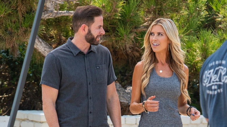 Christina Haack and Tarek El Moussa talking on set