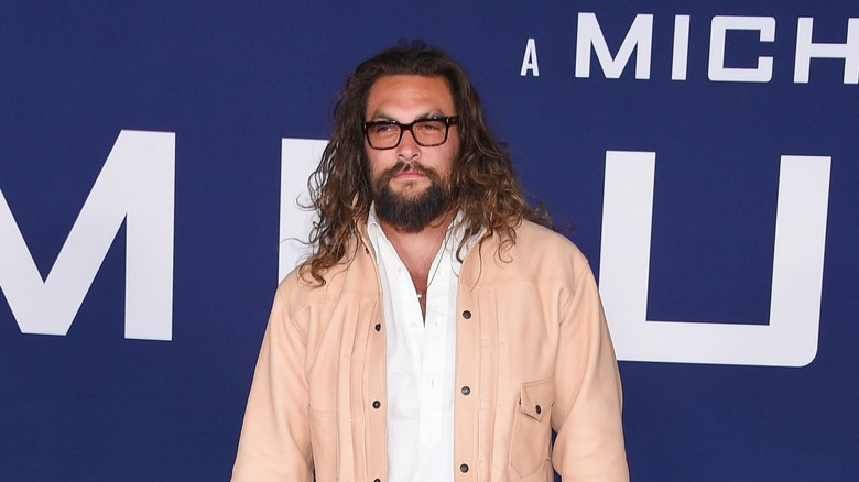 Jason Momoa wearing glasses