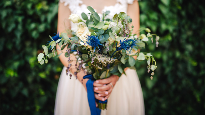 Birde holding bouquet