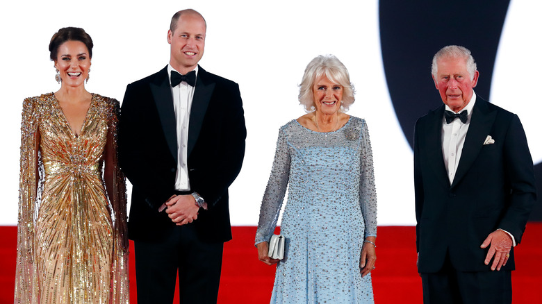 Kate Middleton, Prince William, Camilla Parker Bowles and King Charles posing in their finery