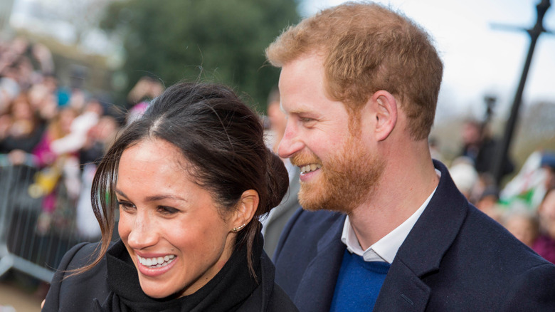 Prince Harry and Meghan Markle smiling 