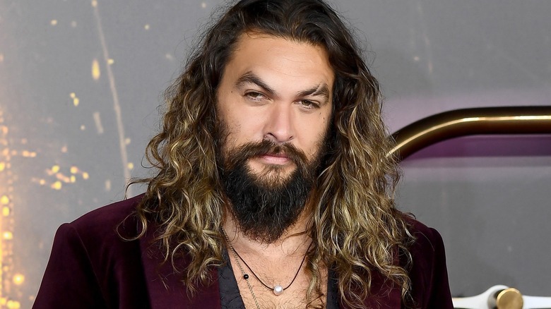 Jason Momoa smirking