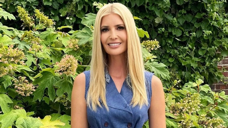 Ivanka Trump posing in blue dress