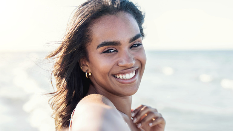 smiling woman at beach