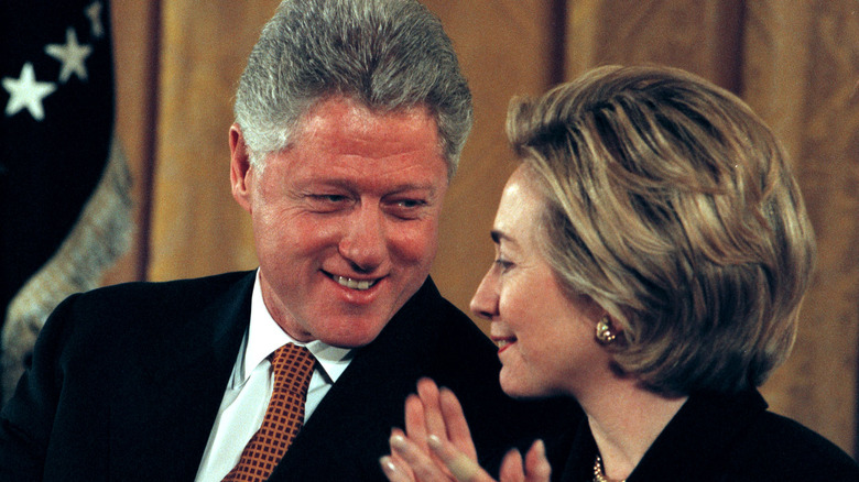 Hillary and Bill Clinton laughing