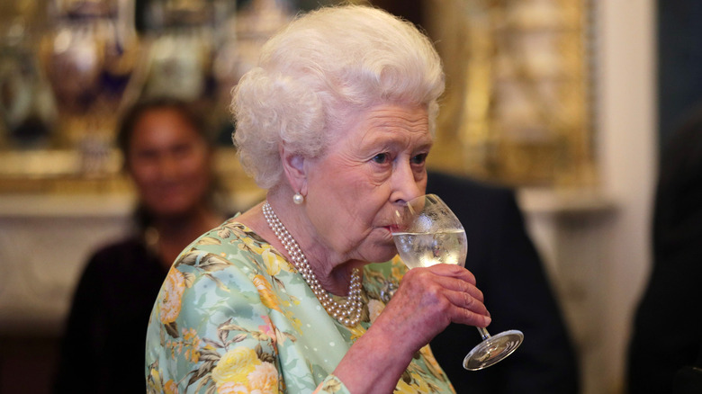 Queen Elizabeth drinking