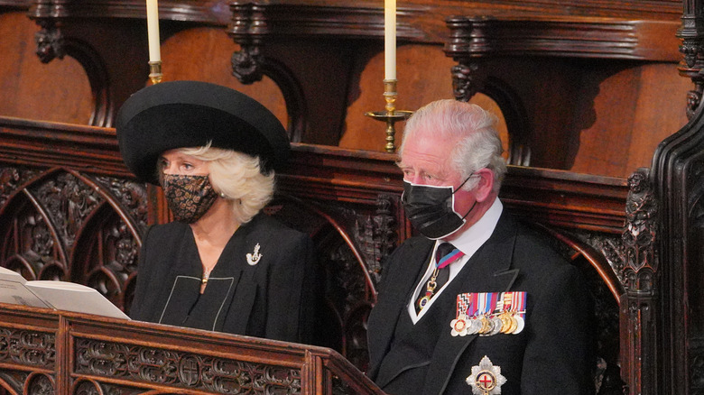 Camilla and Prince Charles attending funeral