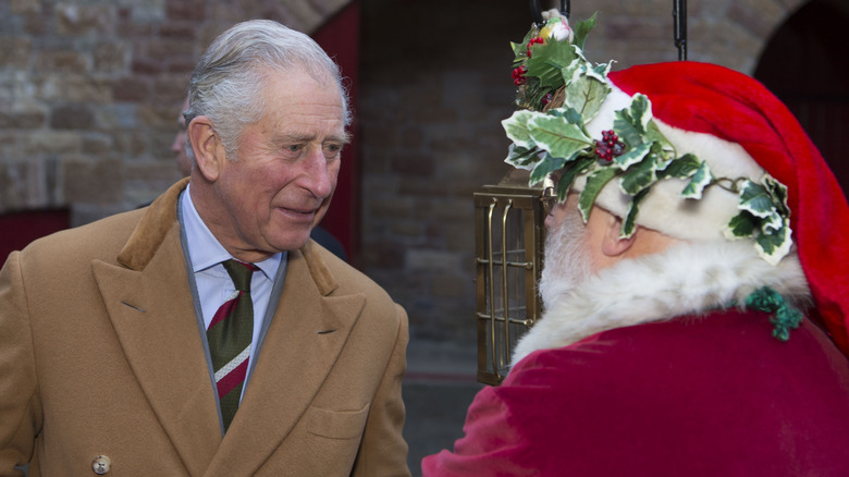 Prince Charles speaking to Santa