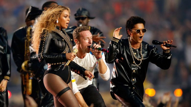 Beyonce, Chris Martin, and Bruno Mars performing 